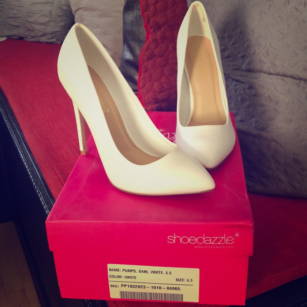 Brand new white pumps